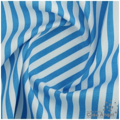 Tecido de algodão azul e branco com riscas verticais e etiqueta 'ALMACENES Casa Angel'
