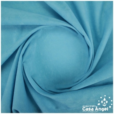 tecido azul claro enrolado com logótipo Casa Angel