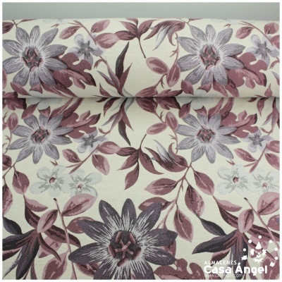 Tecido floral roxo com folhagem sobre fundo creme