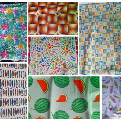 Diferentes tecidos estampados com padrões tropicais, geométricos, peixes, flores, melancias e insetos