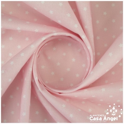 Tecido rosa com pequenas estrelas brancas