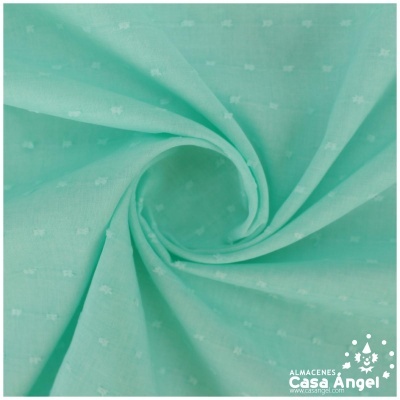 Tecido azul turquesa com pequenos elefantes brancos em padrão