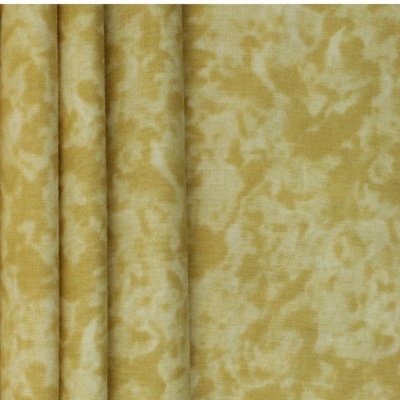 Tecido amarelo claro com padrão abstrato e textura visível