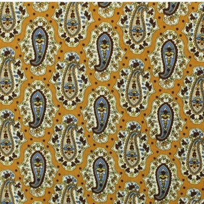 Tecido com padrão paisley castanho, azul e bege