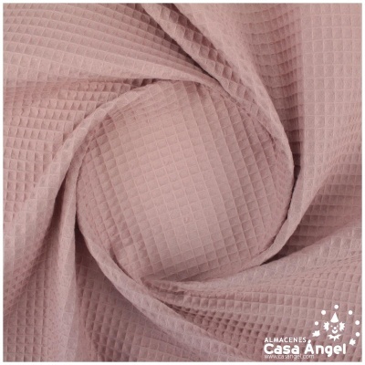 Tecido algodão rosa claro textura quadriculada tipo waffle dobrado em espiral