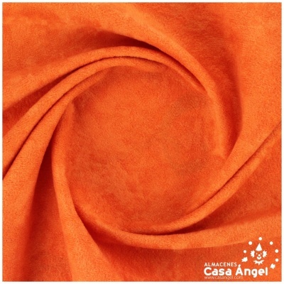 tecido laranja com textura suave enrolado em espiral