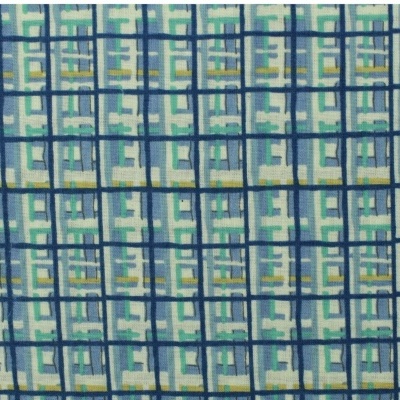 Tecido com padrão geométrico em tons de azul, verde, cinza e amarelo
