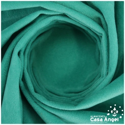 Tecido verde oceano dobrado com logotipo Almacenes Casa Angel