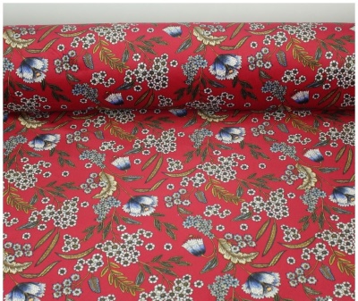 Tecido vermelho com padrão floral colorido
