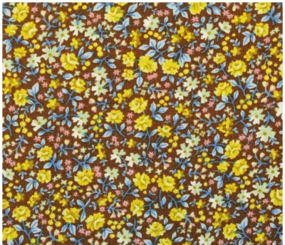 tecido com padrão floral colorido sobre fundo castanho