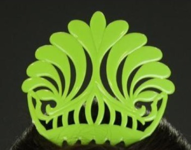 Pente de cabelo verde fluorescente com padrão decorativo