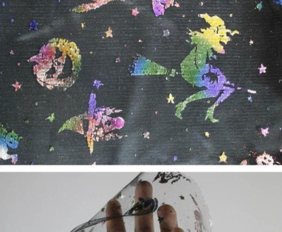 Pano preto com desenho de bruxas, estrelas e luas coloridas e brilhantes