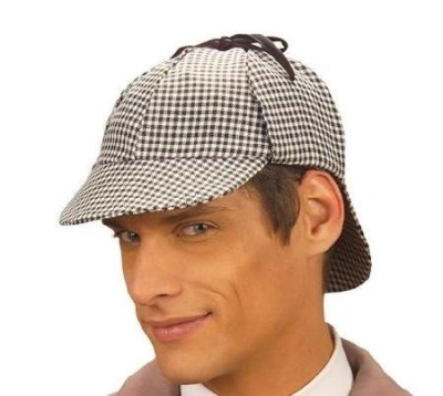 Homem a usar boné estilo Sherlock Holmes em tecido xadrez preto e branco