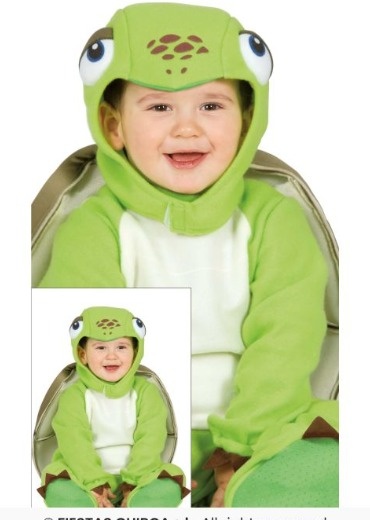 Fato de criança verde e branco com capuz de tartaruga e concha castanha nas costas.