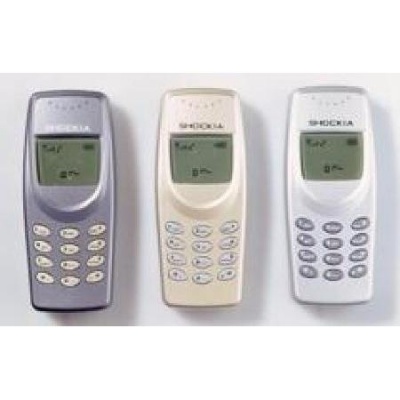 Três telemóveis antigos da SIEMENS em cinzento, bege e branco com ecrã e teclado numérico