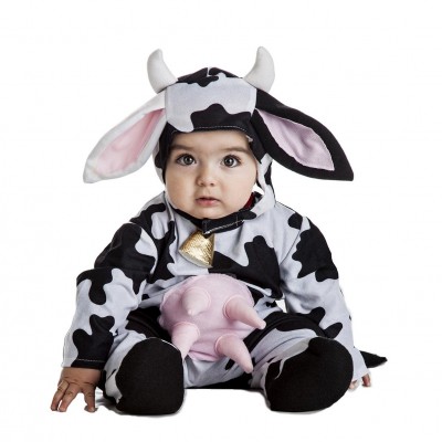 Bebé com fato de vaca preto e branco sentado