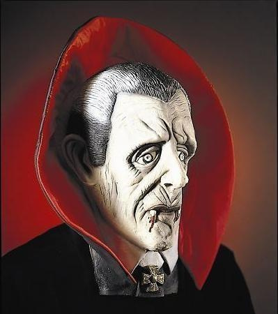 Máscara de vampiro com capa vermelha e preta