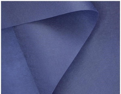 tecido não tecido azul com textura fina e entrelaçada