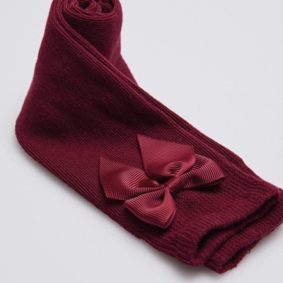 Meia-calça bordô com laço decorativo