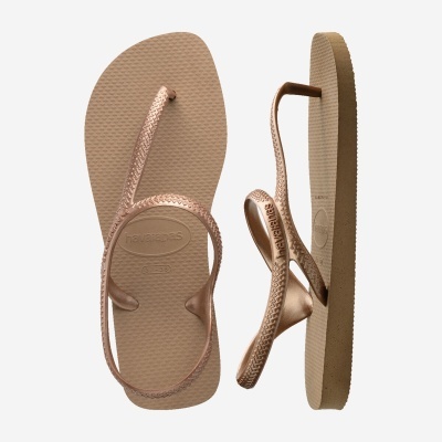 Chinelos Havaianas castanho claro com tira metálica fina e sola texturada
