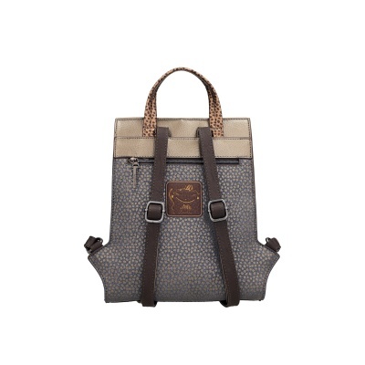 Mochila pequena azul com bolinhas areia e alças castanhas com padrão