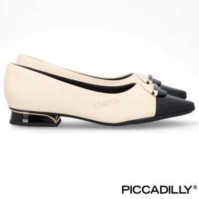 Sapatos de senhora creme e pretos com salto baixo e detalhes metálicos