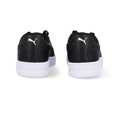 sapatos desportivos pretos Puma com sola branca