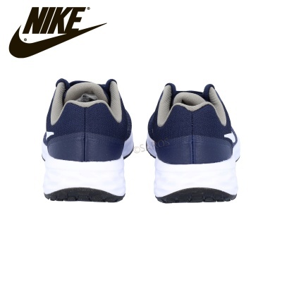 Ténis desportivos Nike azuis vistos de trás com sola branca