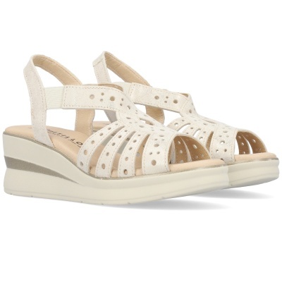 Sandálias de cunha bege claro com tiras cortadas a laser e furos circulares