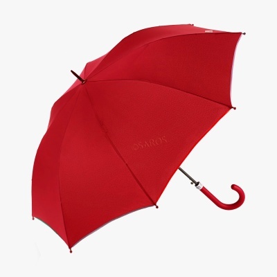 Guarda-chuva vermelho aberto com cabo curvo vermelho