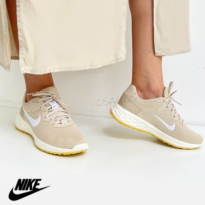 Ténis Nike bege com sola branca e amarela