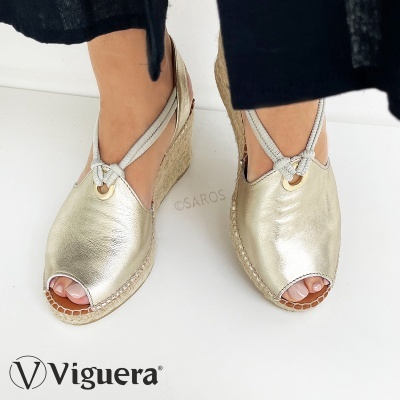 Sandálias de cunha prateadas em pele com salto em corda