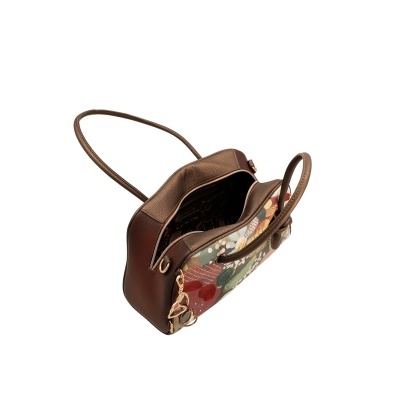 Mala de mão castanha com padrão floral multicolorido e fecho de correr aberto