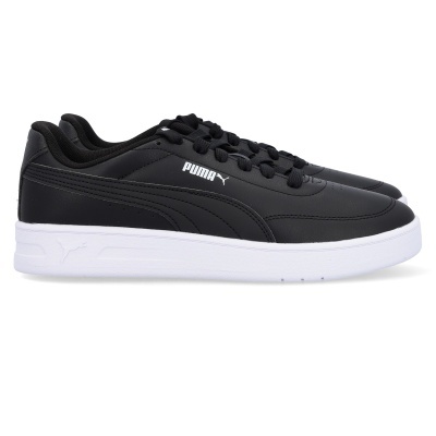 Sapatilhas negras PUMA com sola branca e logo visível