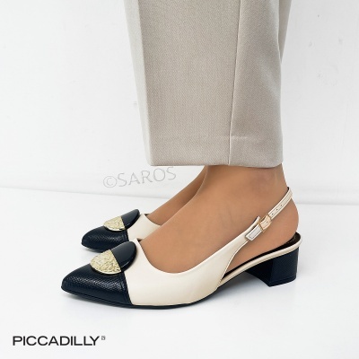Slingbacks bicolores preto e creme com detalhe dourado e salto médio