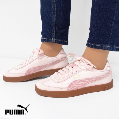 Sapatilhas Puma rosa com sola castanha e padrão listrado lateral