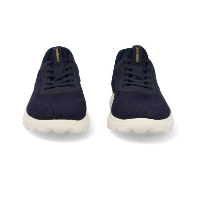 Sapatilhas desportivas azuis com sola branca e etiqueta SPHERICA