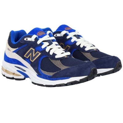 Sapatilhas New Balance azul, cinzento e branco com atacadores brancos