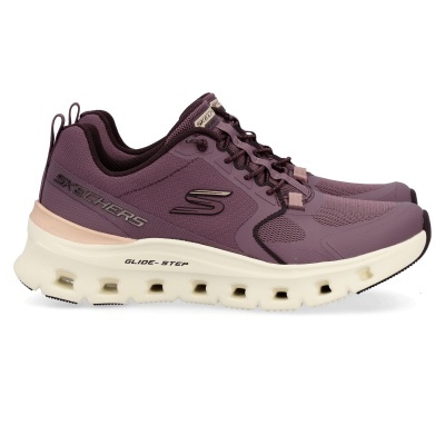 Ténis Skechers cor roxa com sola branca e detalhes em preto.