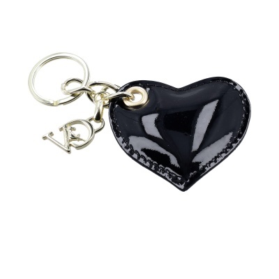Porta-chaves dourado com pendente em forma de coração preto brilhante