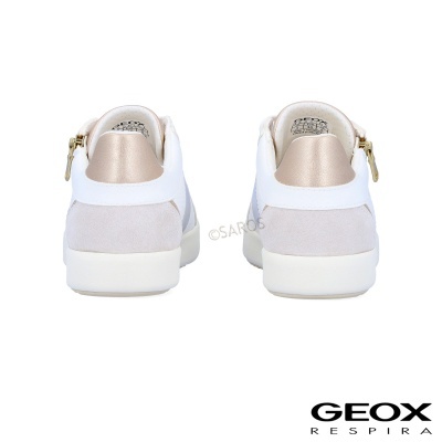 Sapatos brancos e bege com zíper dourado vistos de trás