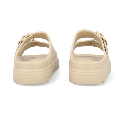 Sandálias de plataforma bege vistas por trás