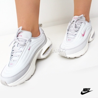 Sapatos desportivos Nike Air brancos com detalhes cor-de-rosa