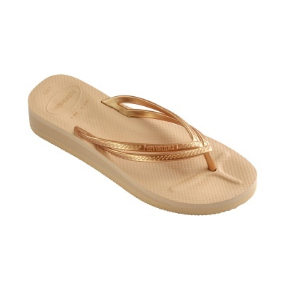 Chinelo Havaianas bege com tiras douradas metálicas e sola almofadada