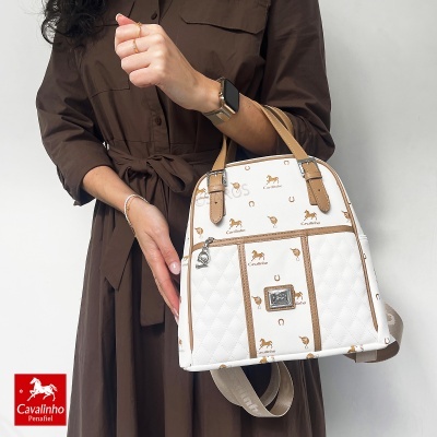 Mala Cavalinho branca e castanha com padrão e fecho prateado