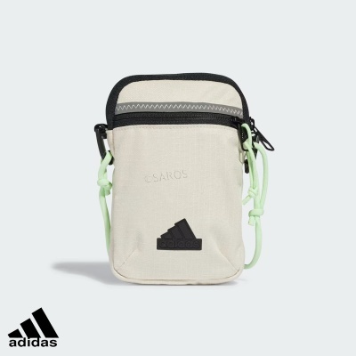 Bolsa pequena Adidas bege com fecho preto e cordões verdes claros