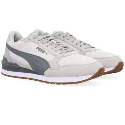 Sapatilhas Puma cinzentas e bege claro em fundo branco