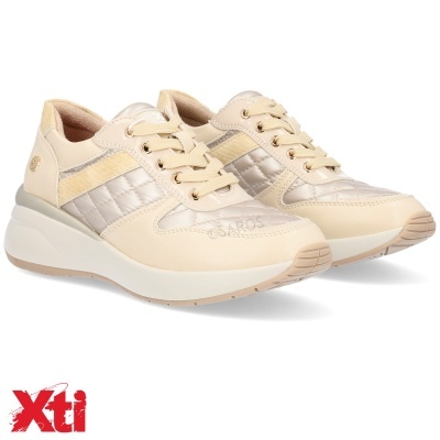 Ténis femininos bege com detalhes metalizados e sola espessa