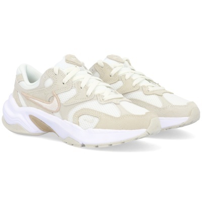 Sapatilhas desportivas brancas e bege da Nike com logo em bege.