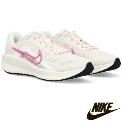 Sapatilhas Nike bege com detalhes rosa e sola branca e preta